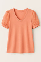 Elegant T-shirt – Puffærmer og Flatterende V-hals i Blød Bomuldsblanding